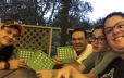 family playing a game at a picnic table