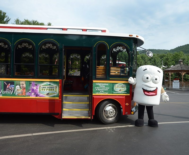 Mascot showing off trolley