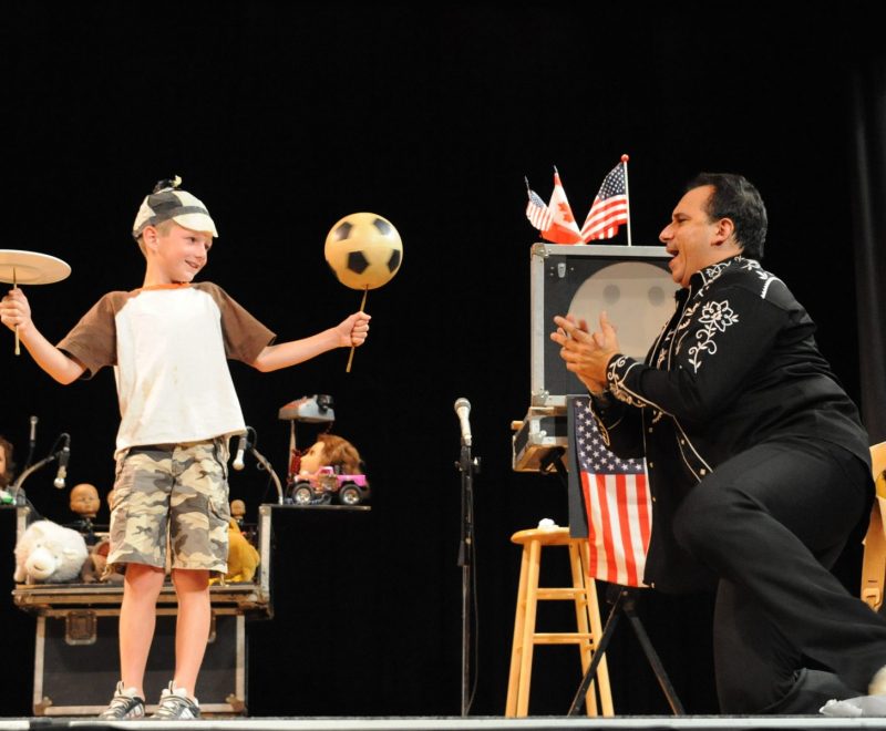 Yong volunteer during magic show