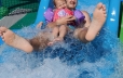 Kid and daughter on waterslide