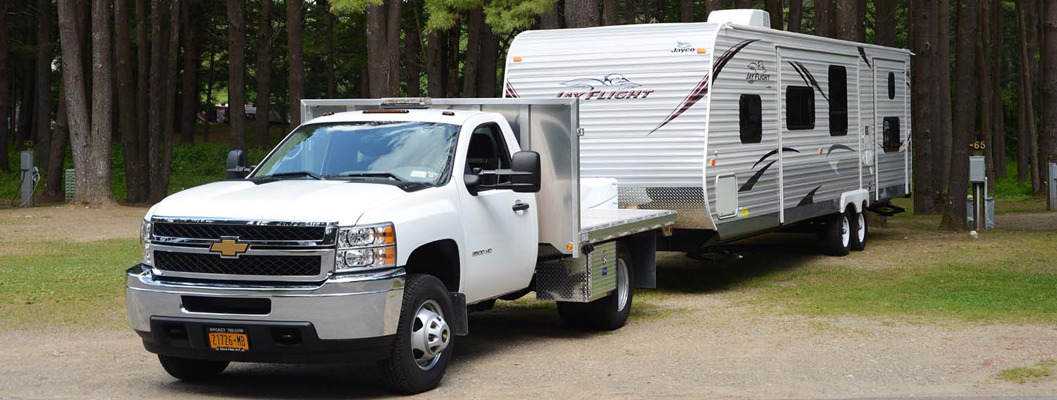 RV trailer backing into site #65