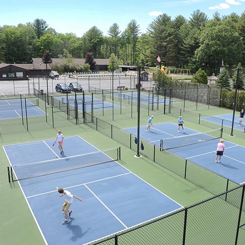 Guests playing at our pickle ball courts