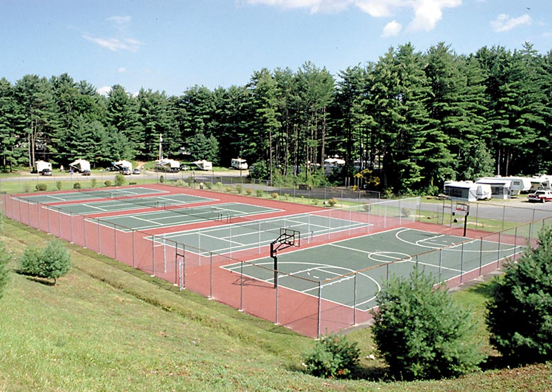 View of our four tennis courts and one of our basketball courts located on east end of park