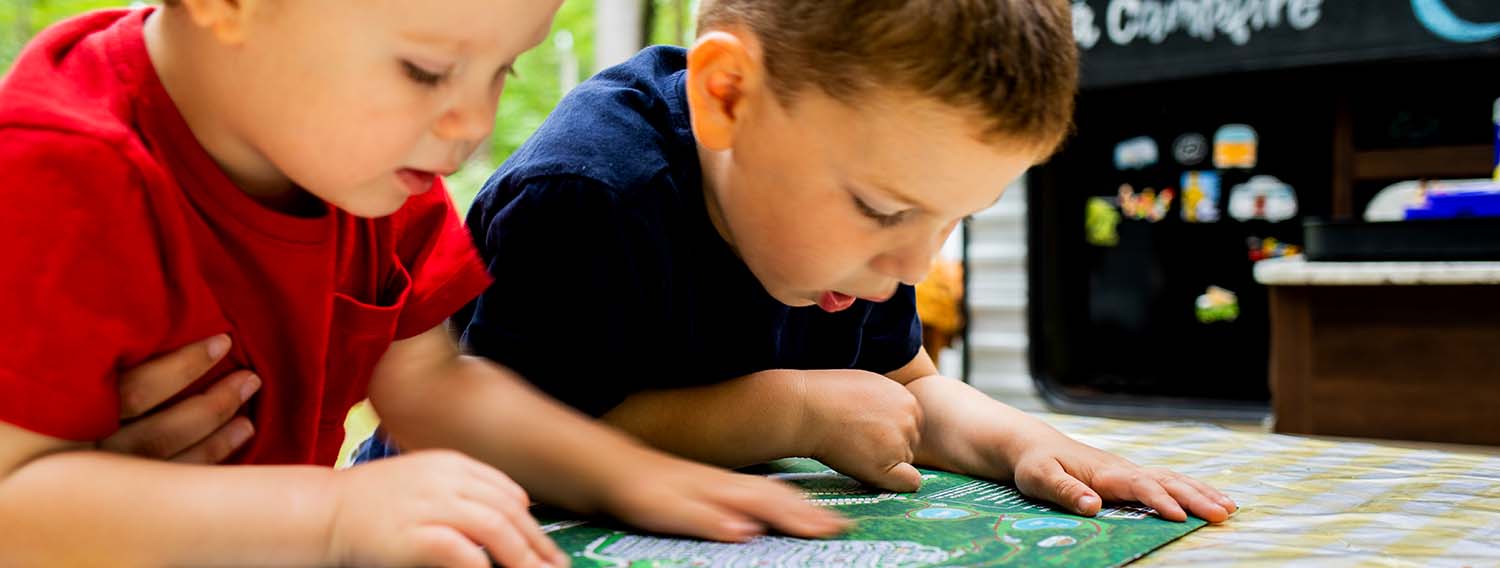 Kids looking at map