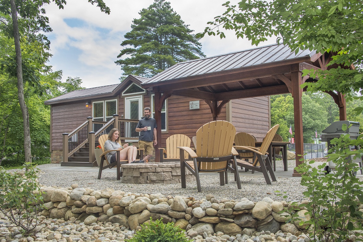 Couple enjoying time outdoors at one of our new cabins