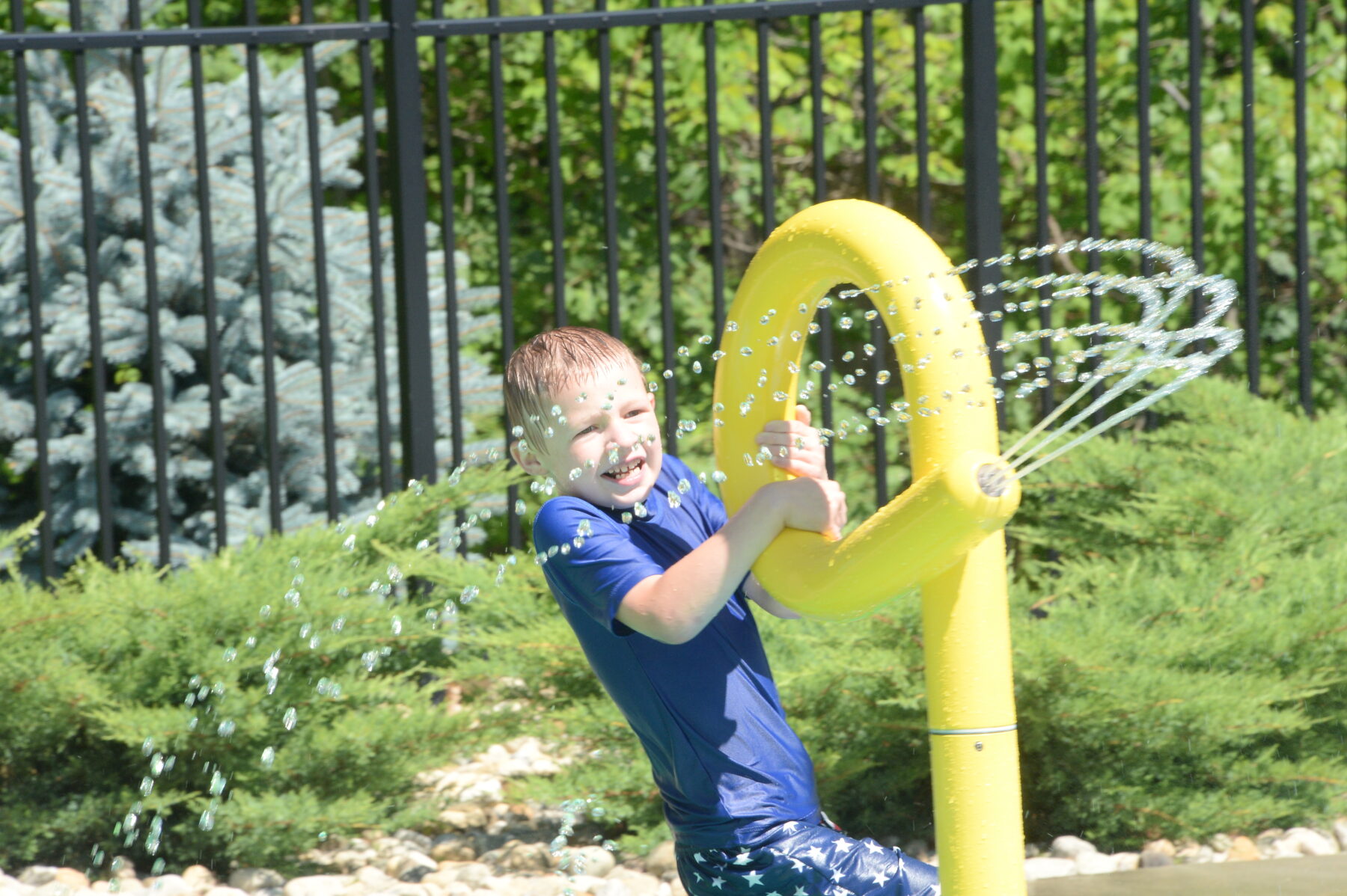 Child playing on Splash Pad